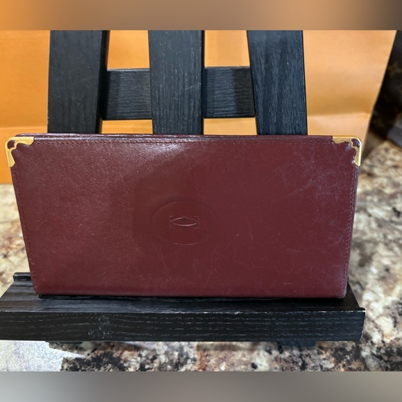 Cartier Handbags - Cartier Bordeaux Bifold Long leather wallet